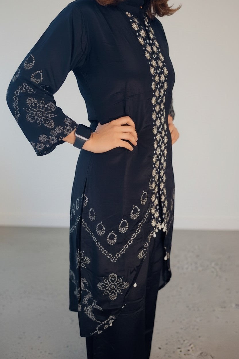 Eclipse-The Label black pure crepe set with crew neck, hand-printed motifs and intricate hand embroidery on sleeves and front.