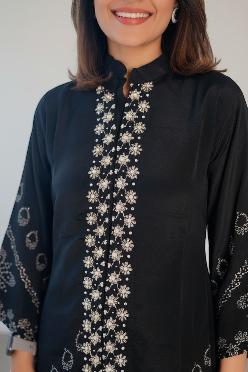 Eclipse The Label black pure crepe set with crew neck, hand-printed motifs, and intricate hand embroidery on the front and sleeves.