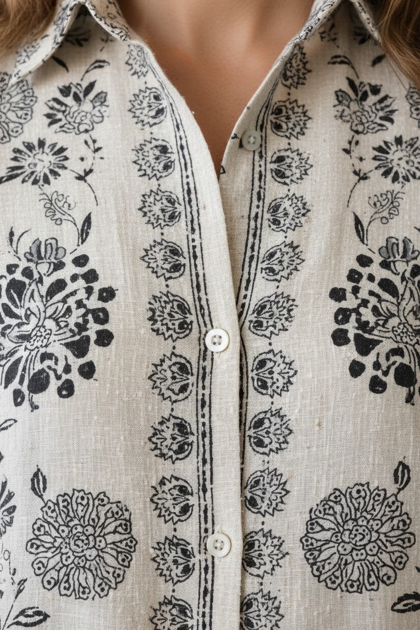 Eclipse-The Label ivory cotton-linen blend co-ord set with black hand-printed botanical motifs and a collared shirt.