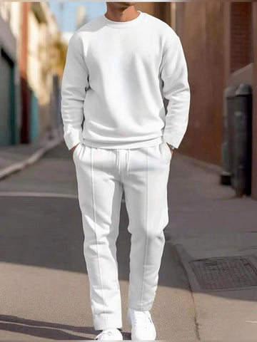 Asymmetric Black Top with White Trousers white1