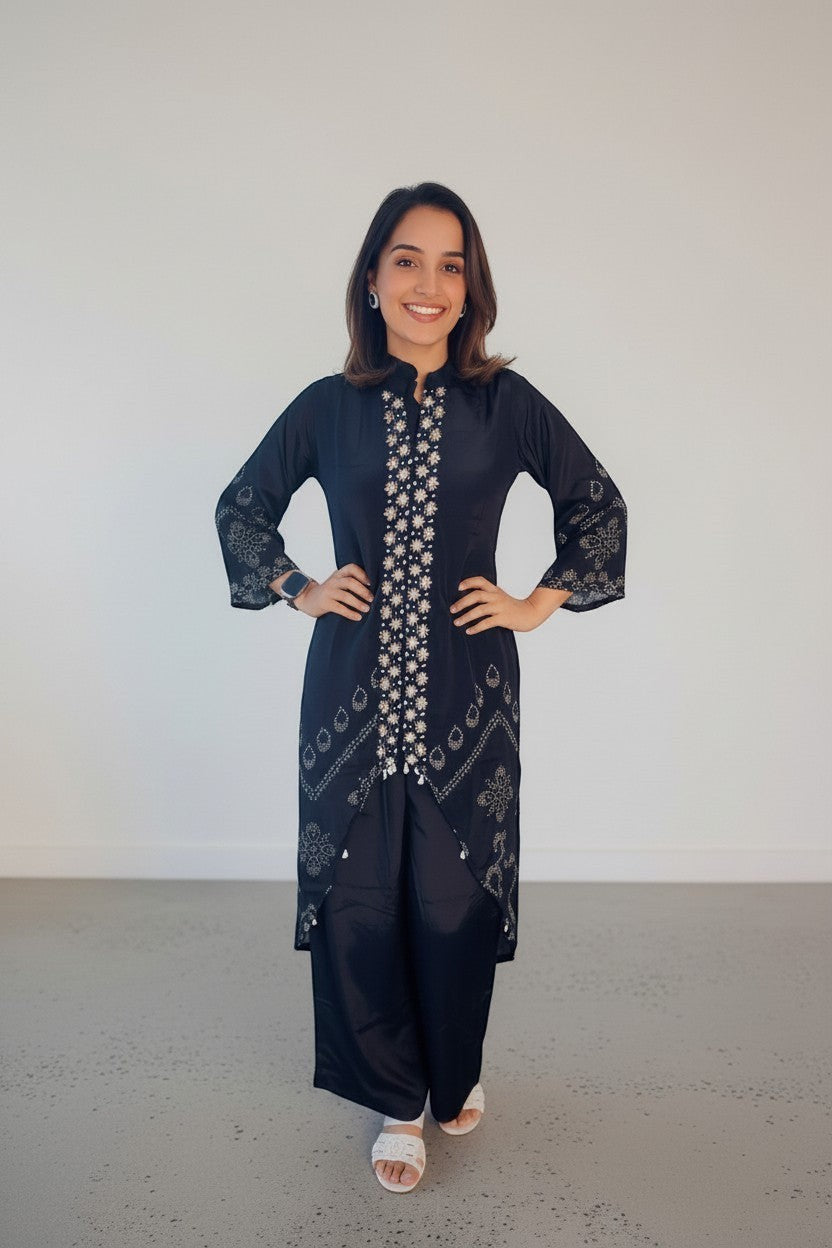 Eclipse-The Label black pure crepe set with crew neck, hand-printed motifs and hand embroidery on the front and sleeves.