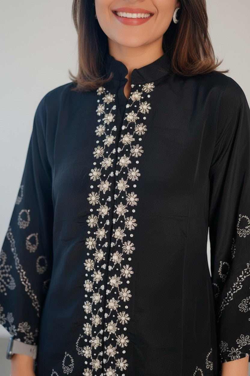 Eclipse-The Label black crepe set with crew neck, hand-printed motifs and intricate hand embroidery on front and sleeves.